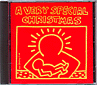 Omslag: A Very Special Christmas med en slarvigt tecknad madonna med barn i guld och röd bakgrund